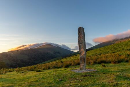 Menhir of Arlobi at sunset, Gorbea Natural Park, Alava, Spainの写真素材