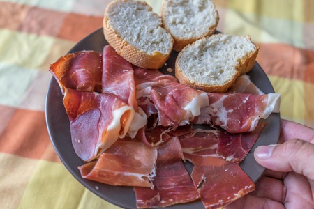 Rustic bread and serrano Hamの写真素材
