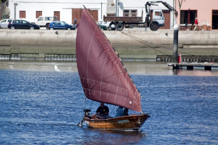 Vila do Conde - Portugal - June 2011. Sailboat "A Barola" in IX Meeting of Traditional Boats.  Every year, traditional boats from Iberian Peninsula sails by Ave river to show their features during Saint Johnのeditorial素材