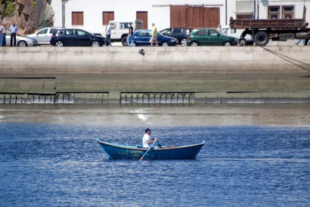 Vila do Conde - Portugal - June 2011. Oars boat "O Canote" in IX Meeting of Traditional Boats.  Every year, traditional boats from Iberian Peninsula sails by Ave river to show their features during Saint Johnのeditorial素材