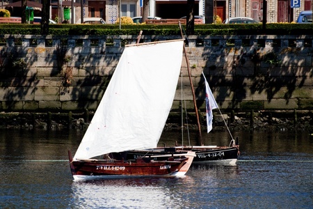 Vila do Conde - Portugal - June 2011. Sailboat "Xaimina" in IX Meeting of Traditional Boats.  Every year, traditional boats from Iberian Peninsula sails by Ave river to show their features during Saint Johnのeditorial素材