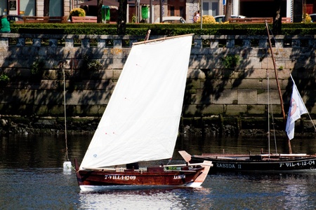 Vila do Conde - Portugal - June 2011. Sailboat "Xaimina" in IX Meeting of Traditional Boats.  Every year, traditional boats from Iberian Peninsula sails by Ave river to show their features during Saint Johnのeditorial素材