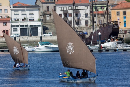 Vila do Conde - Portugal - June 2011. Sailboats Baltazar and Briosa in IX Meeting of Traditional Boats.  Every year, traditional boats from Iberian Peninsula sails by Ave river to show their features during Saint Johnのeditorial素材