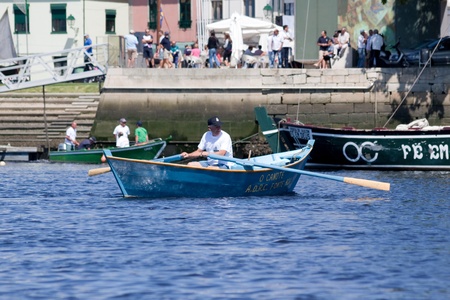 Vila do Conde - Portugal - June 2011. Oars boat "O Canote" in IX Meeting of Traditional Boats.  Every year, traditional boats from Iberian Peninsula sails by Ave river to show their features during Saint Johnのeditorial素材