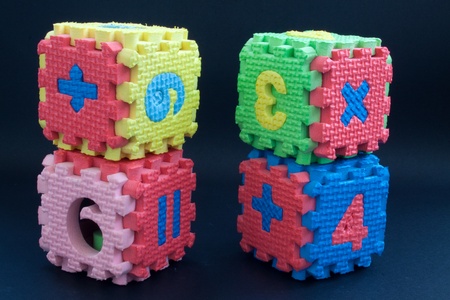 Simple cube construction with numbers and signals made by a child の写真素材