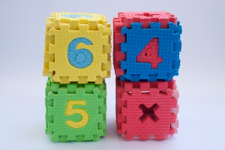 Simple cube construction with numbers and signals made by a child の写真素材