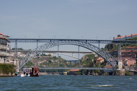 Porto is a city with six bridges across the Douro river. At this point of the Douro river we can see the Dom Luis Bridge, the Infante Dom Henrique Bridge, the Dona Maria Pia Bridge and the Sao Joao Bridge.の写真素材