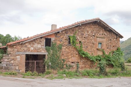 Mogrovejo is a village into the mountain scenary of Picos de Europa in Spain. Its houses of stone and brick were built in the 16-18th centuries. The village has been listed as a site of historic and cultural significance.の写真素材
