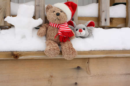 Christmas Bear making a snowbearの写真素材