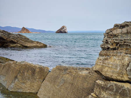 the rocky shore of the ocean