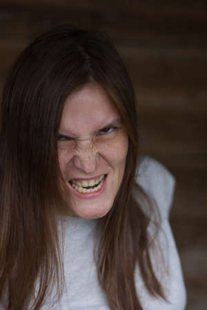 Horror monster looks and smiles terribly