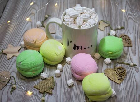 cup of coffee and cookies on tableの写真素材