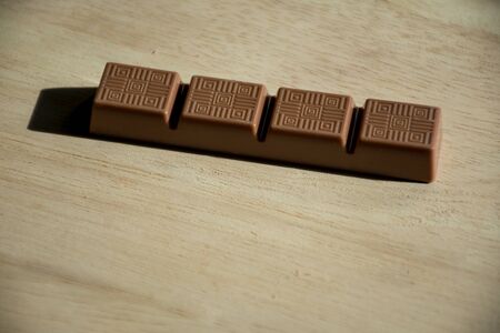 chocolate on wooden background