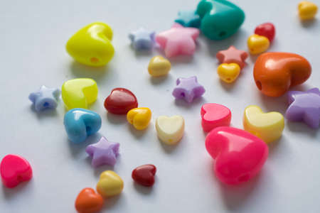 colored beads on white background