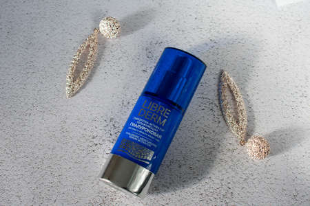 Izhevsk, Udmurt Republic, Russian Federation, October 25, 2021: Facial serum in a blue jarのeditorial素材