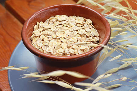 Oats cereal, cereals, rustic, wooden, background, diet breakfast, healthy lifestyleの写真素材