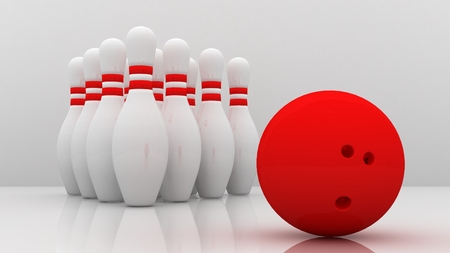 Bowling ball with pins isolated on white backgroundの写真素材