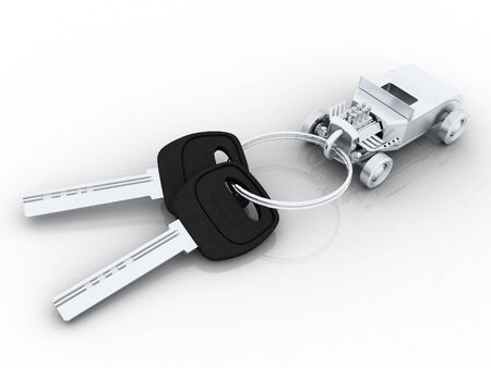 Car keys with car key ring isolated on white. Concept for owning or buying a new or pre-owned second hand car or car rentals, leasing a car or insuring your car.の写真素材