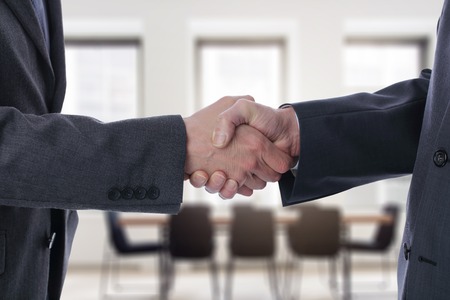 Successful handshaking after good deal. Business partnership meeting concept.の写真素材