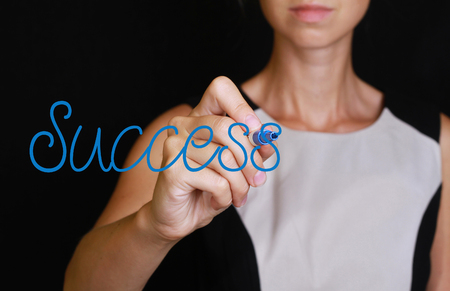 Success. Close up of businesswoman writing on screen. Business, teamwork and finance.の写真素材