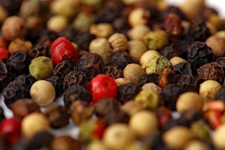 White, red and black pepper background.の写真素材