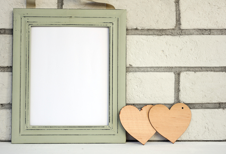 Empty picture in frame shabby chic, vintage style. Scandinavian style home interior decoration. Copy paste image.の写真素材