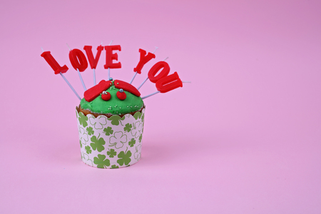 Love You cupcake with candles. Happy Birthday, Valentine Day, celebration concept, copy spaceの写真素材