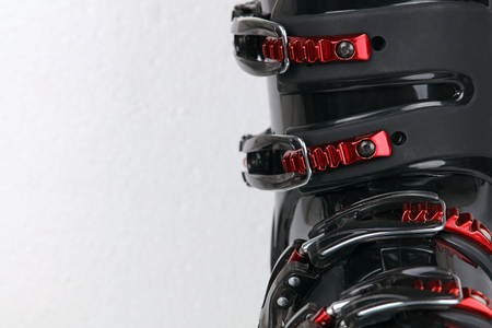 Ski boots preparing for winter season. Winter sports and activities concept background.の写真素材