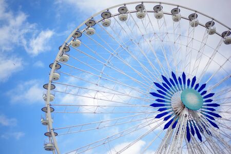 Ferris wheel symbol of Marseille based in old port of Marseille, Provence, France with summer blue...