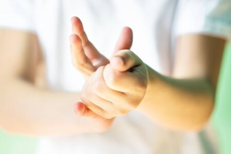 Closeup picture of hands during washing by antibacterial liquid. Hand disinfection with antiseptic. Prevention of coronavirus covid-2019 infection during pandemic. Health and medical care for humans.の写真素材