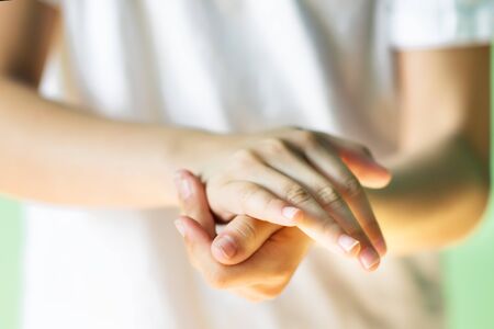 Closeup picture of hands during washing by antibacterial liquid. Hand disinfection with antiseptic....