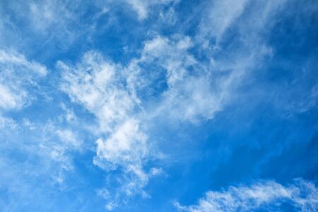Sunshine clouds sky in morning background. Blue, white pastel heaven, soft focus lens flare sunlight. Abstract blurred cyan gradient of peaceful nature. Open view out windows beautiful summer spring.の写真素材