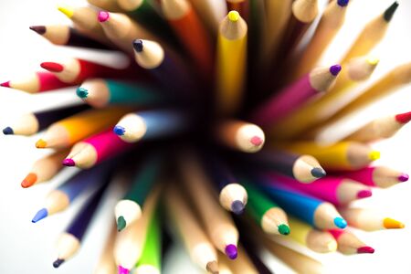 Top view of assortment of colored pencils. Colored Drawing Pencils. Colored drawing pencils in a variety of colors. Close-up. Tools for painting on quarantine.の写真素材