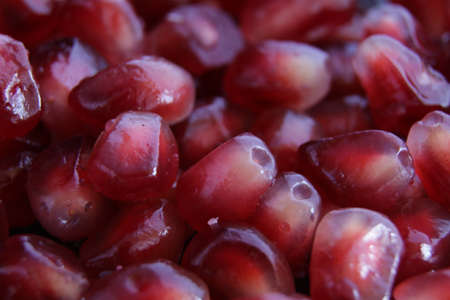 pomegranate seeds in juiceの写真素材
