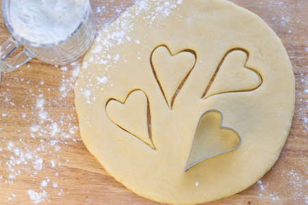 Hearts on cookie dough の写真素材