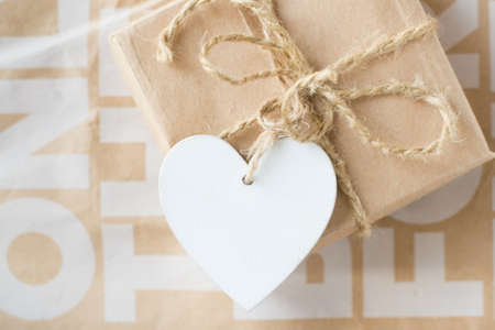 Gift with wooden heartの写真素材