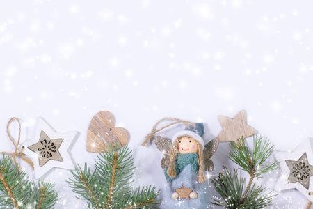 Christmas background with fir branches and snowflakesの写真素材