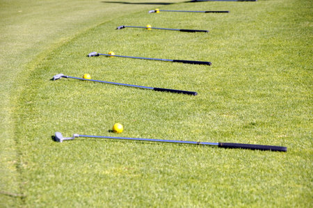 Golf Course, Club, Balls, Grass, Djerba, Tunisia, with green grass and blue sky backgroundの写真素材