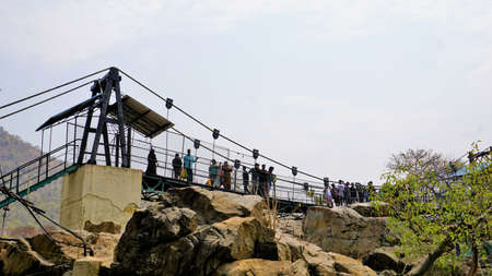 Hogenakkal,Tamilnadu,India-March 19 2022: Tourists enjoying Beautiful scenic view of Hogenakkal...