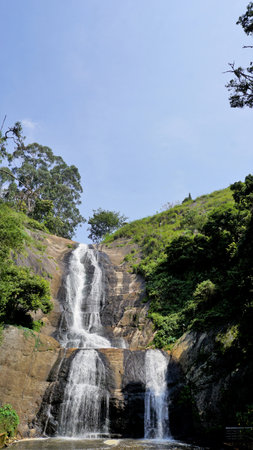 Beautiful scenic view of kodaikanal silver cascade water falls. Located in Top tourist attraction for family, friends and honeymoon destinationの写真素材