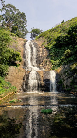 Beautiful scenic view of kodaikanal silver cascade water falls. Located in Top tourist attraction for family, friends and honeymoon destinationの写真素材