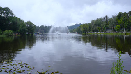Amazing view of ooty lake with boats and fountain. Beautiful destination for couples, friends and families.の写真素材