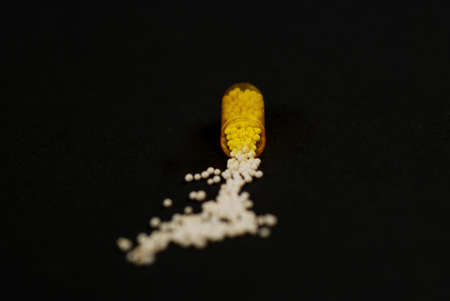 pictures of capsule pills showing the medicine inside itの写真素材