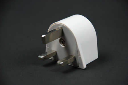 electrical adaptors used to connect to the electricity in several countriesの写真素材
