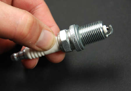 stock pictures of a sparkplug for a lawnmowerの写真素材