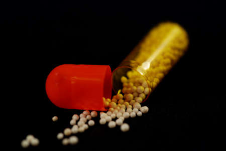pictures of capsule pills showing the medicine inside itの写真素材