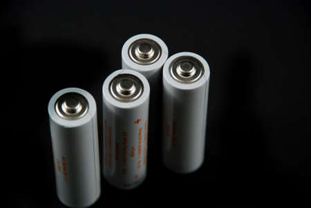 isolated pictores of electrical batteries on black backgroundの写真素材