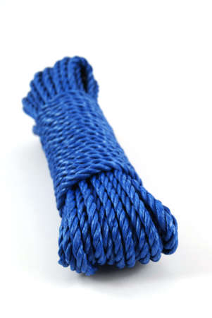 three coils of rope in green, blue and red