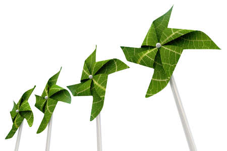 A green windmill made out of leaves isolated on a white background 