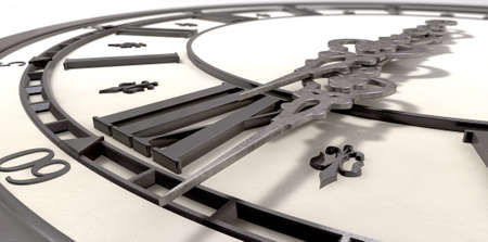 An extreme closeup of an antique clock  with roman numerals and ornate metal hands on an isolated backgroundの写真素材